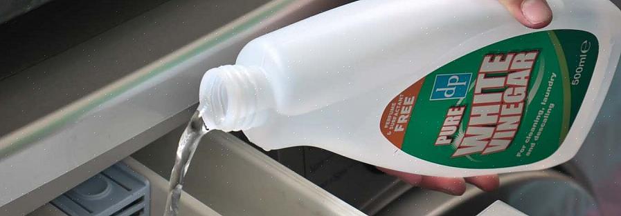 Laat u het kledingstuk 30 minuten in onverdunde azijn weken