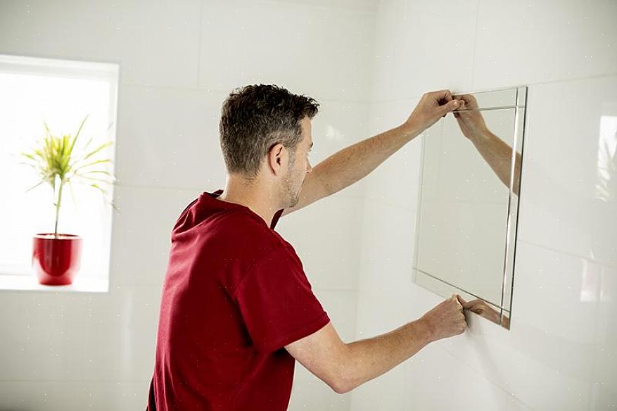 Hang zware spiegels op met schroeven