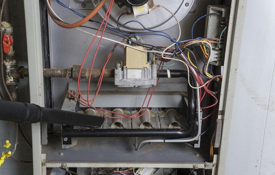 Als je oven een kleine ronde knop op de gasklep heeft met de woorden OFF / ON / PILOT